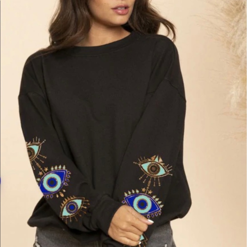 Evil eye 🧿 sweatshirt size small. New with tags. Soft. Comfortable. Trendy.